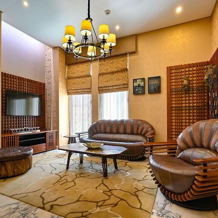 Palavra Resort Manama Exterior photo A living room in a house