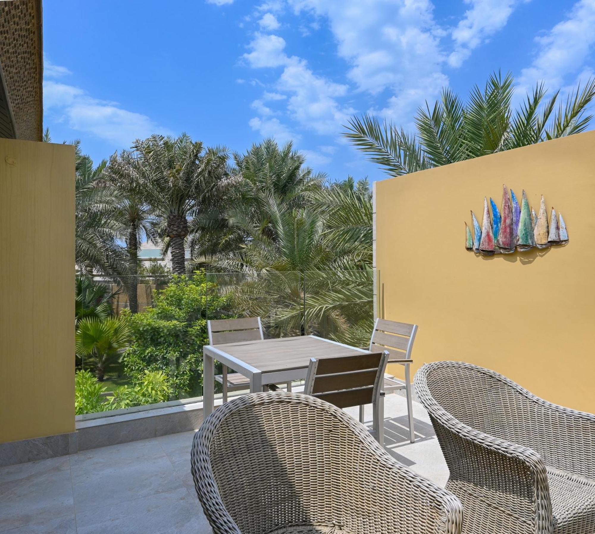 Palavra Resort Manama Exterior photo A balcony at the hotel