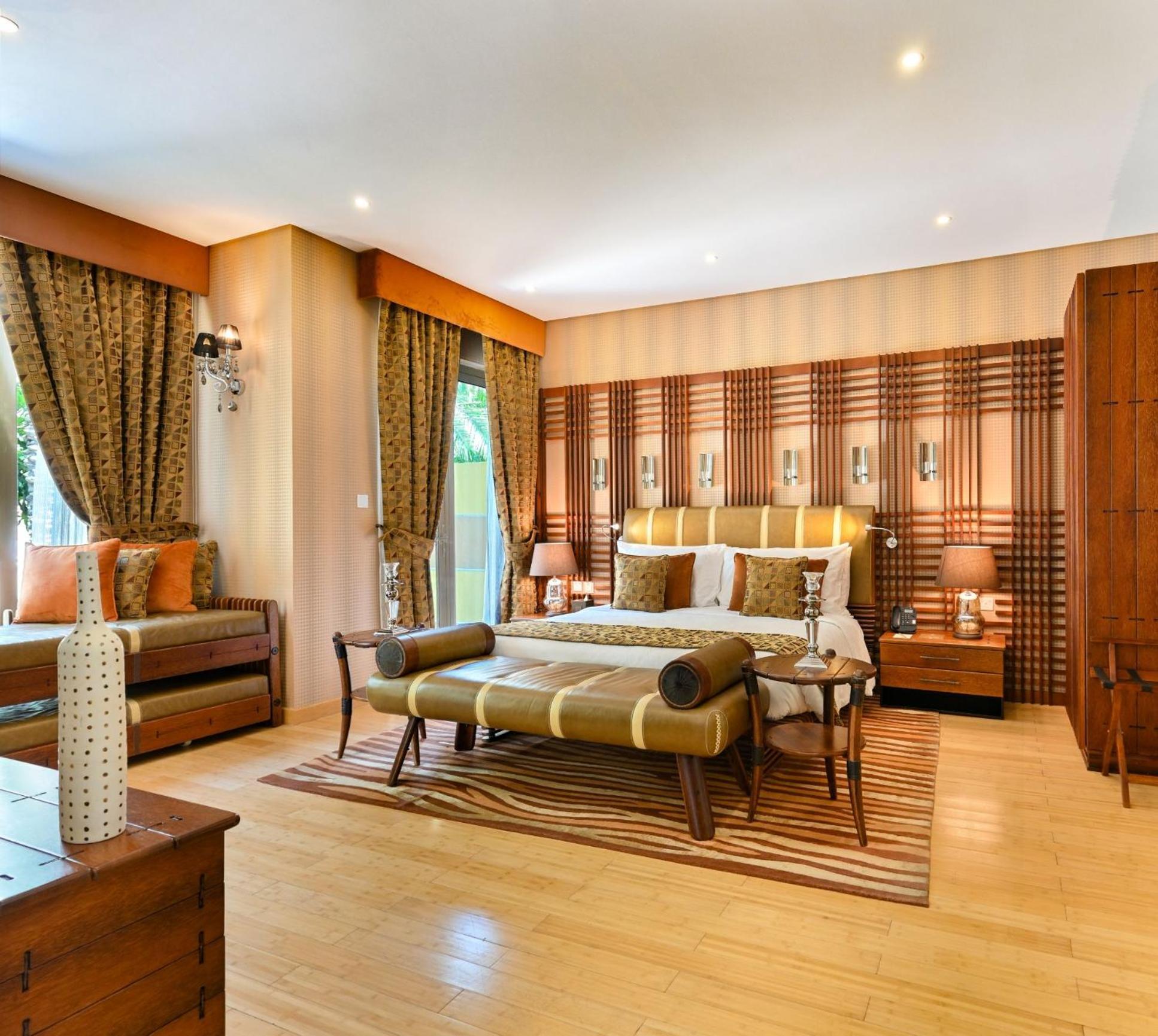 Palavra Resort Manama Exterior photo A bedroom at the Taj Bengal