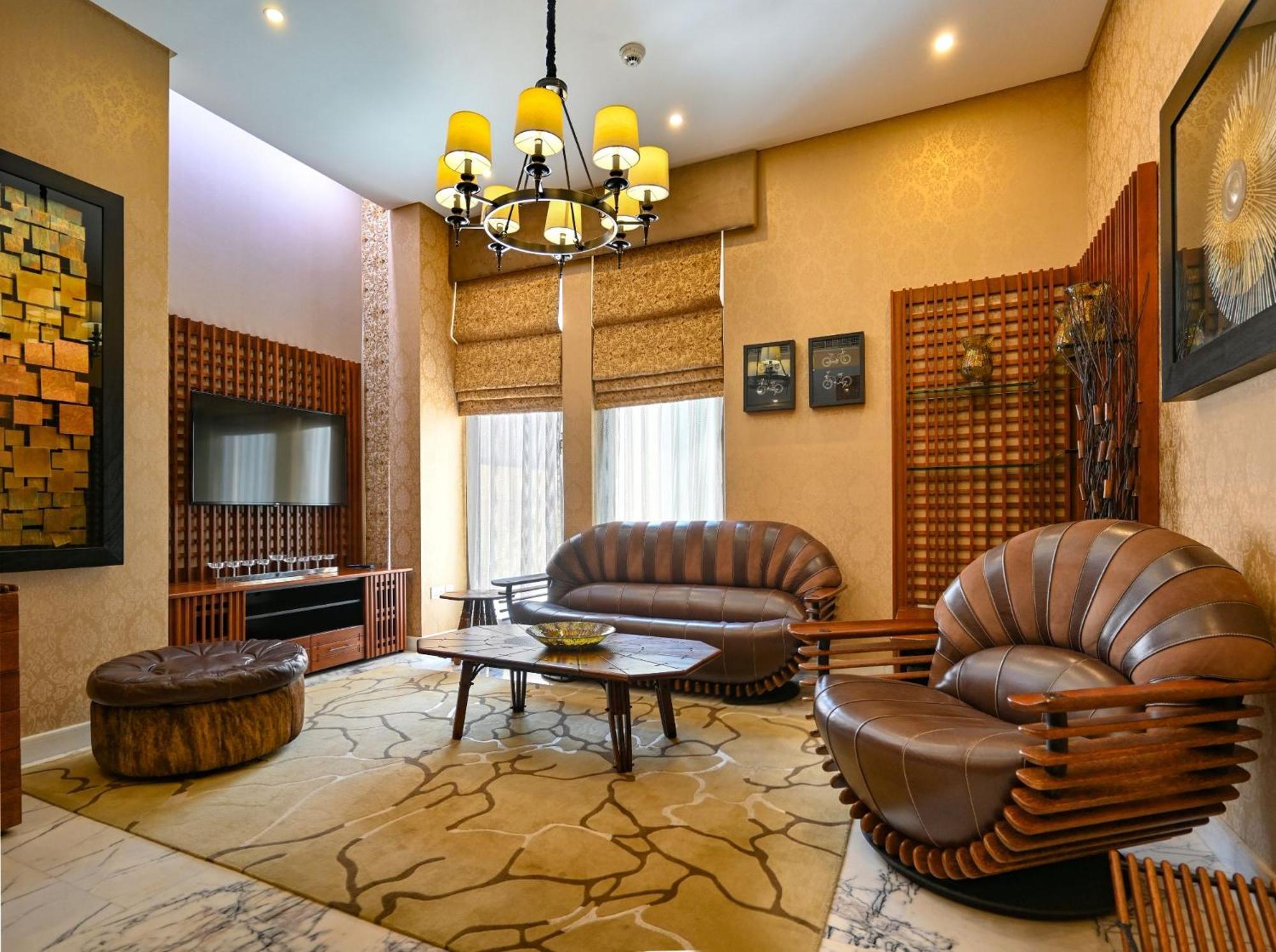 Palavra Resort Manama Exterior photo A living room in a house